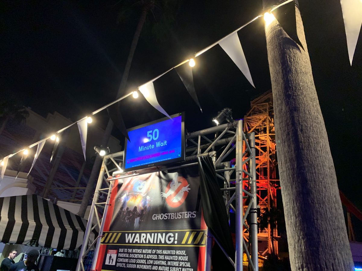 HHN29 Ghostbusters signage showing 55 mins wait to get into the house
